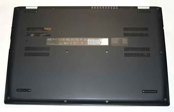 A laptop computer with a battery that is accessible by removing the base