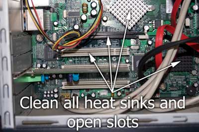 Clean all heat sinks and open slots