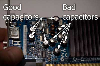 Top view of the graphics card showing the difference between a good and bad capacitors