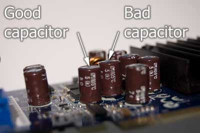 Side view of the graphics card showing the difference between a good and bad capacitor