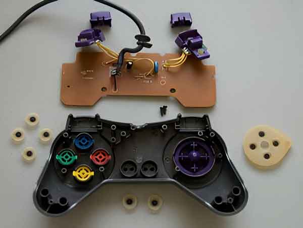 The Gravis Gamepad Pro completely disassembled